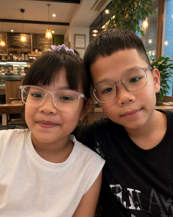 A real photo of two kids